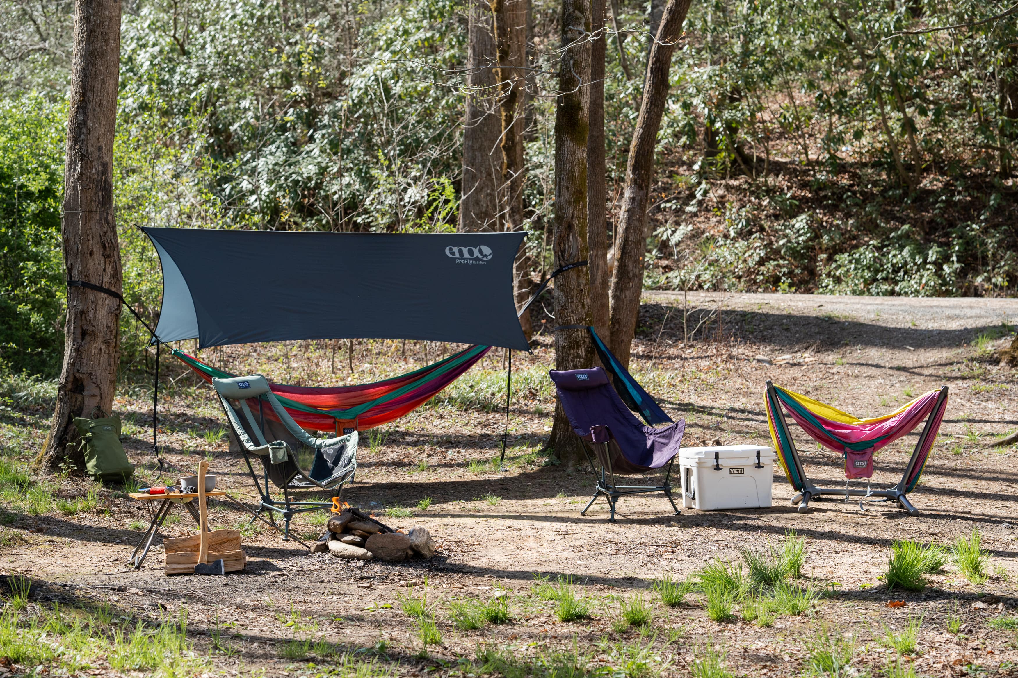 A hammock camping set up without any people displays the variety of gear ENO makes