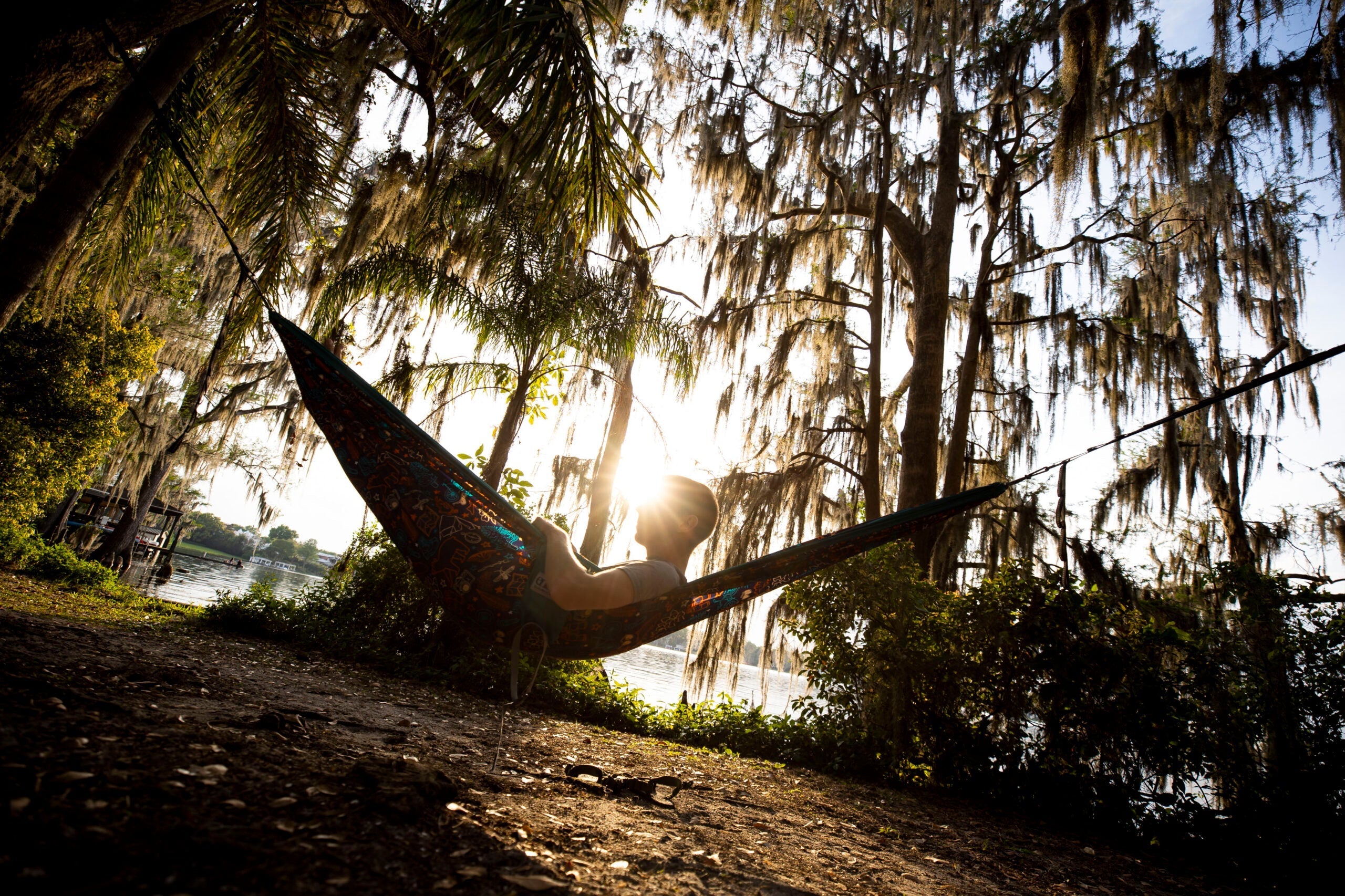 A man hammocking in an ENO hammock
