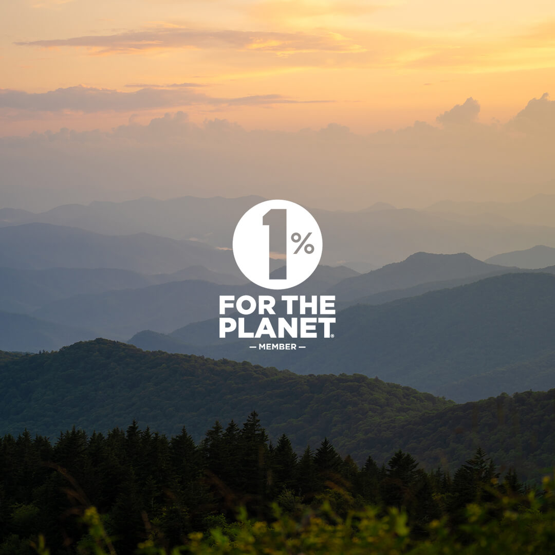 Mountain landscape with '1% for the Planet' logo overlay