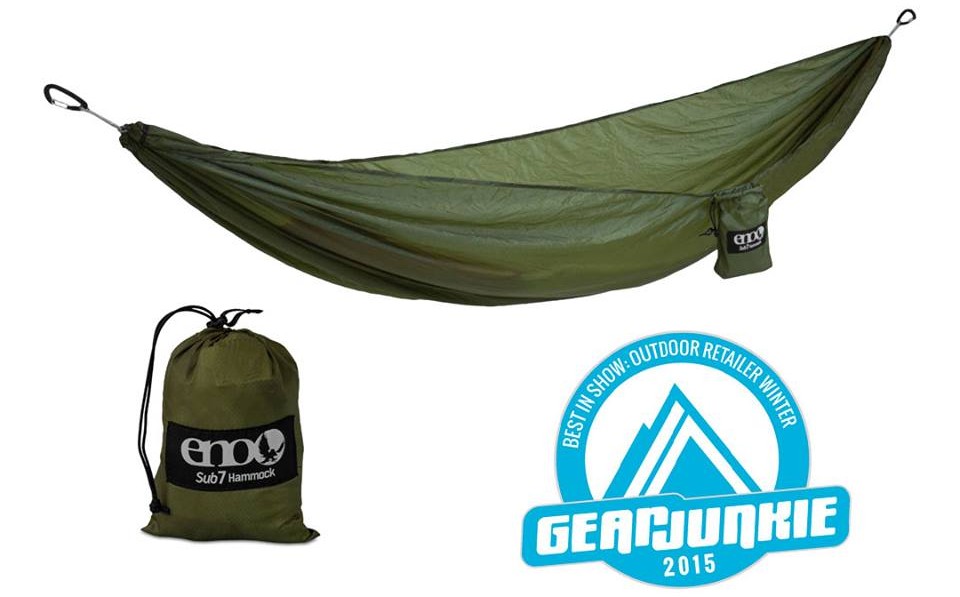 Product photo display with a green hammock fully extended, a green ENO hammock stuff sack, and the GearJunkie logo