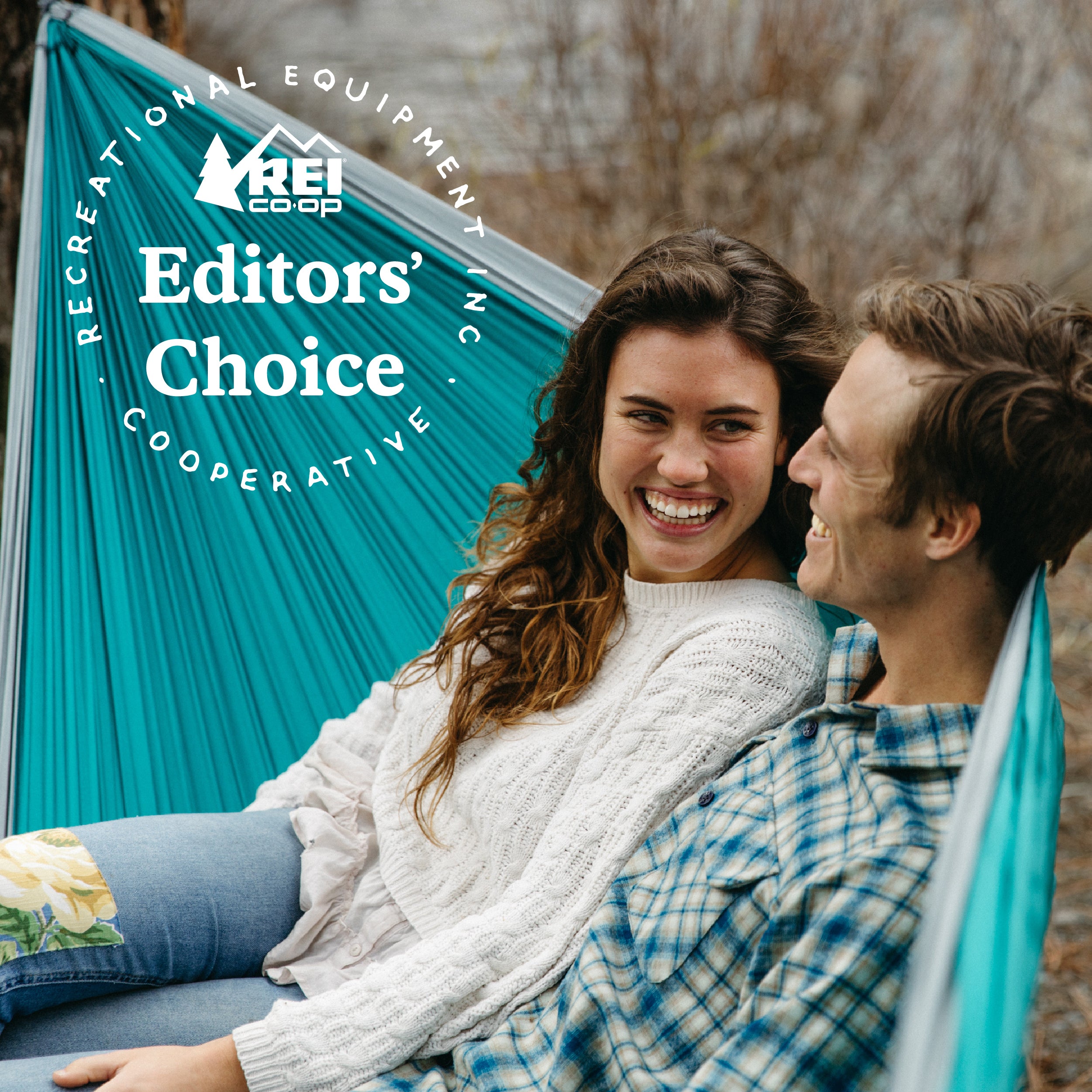 man and woman in ENO DoubleNest hammock with REI editor choice logo
