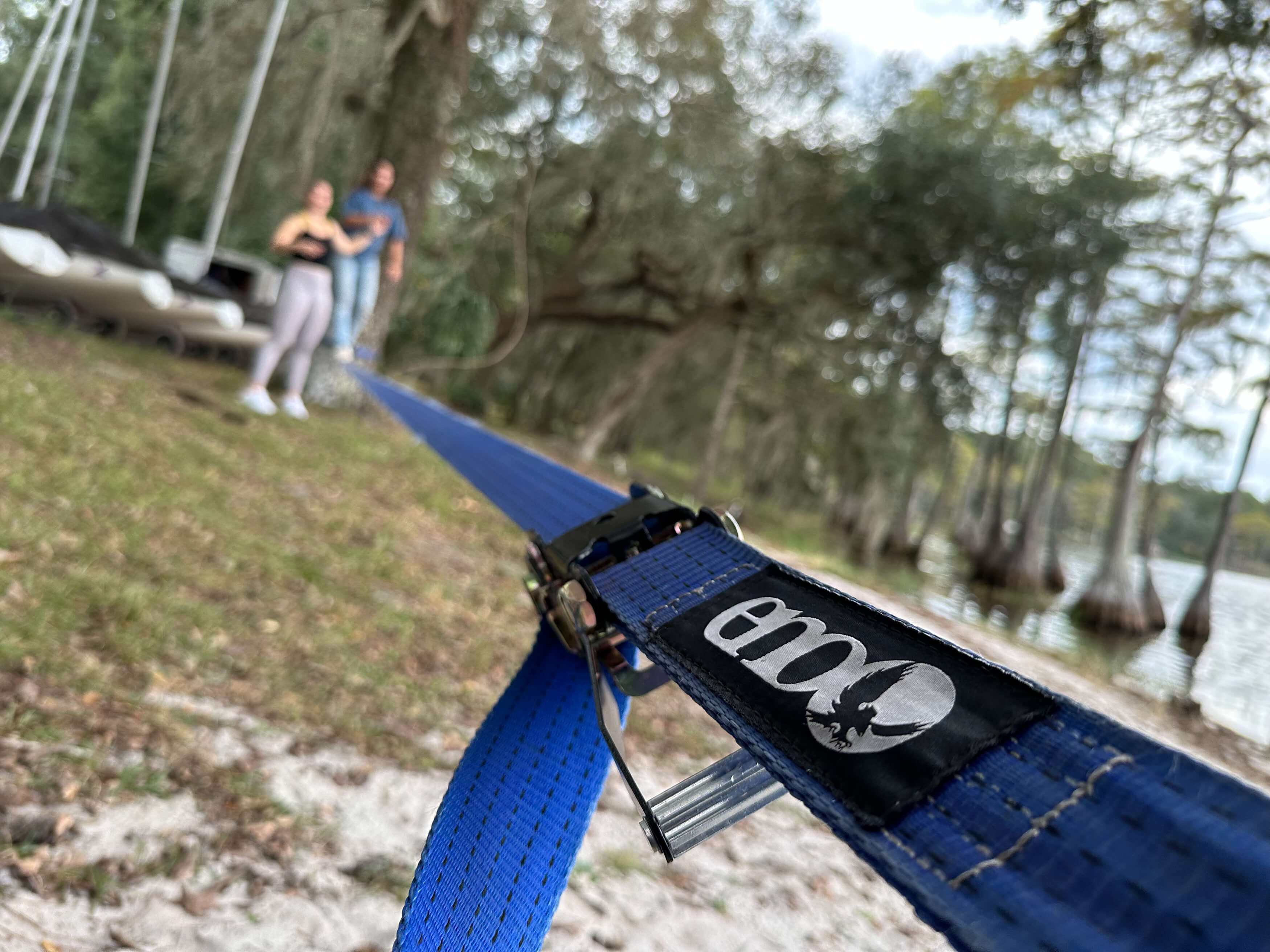 Two girls using an ENO Slackwire Slackline