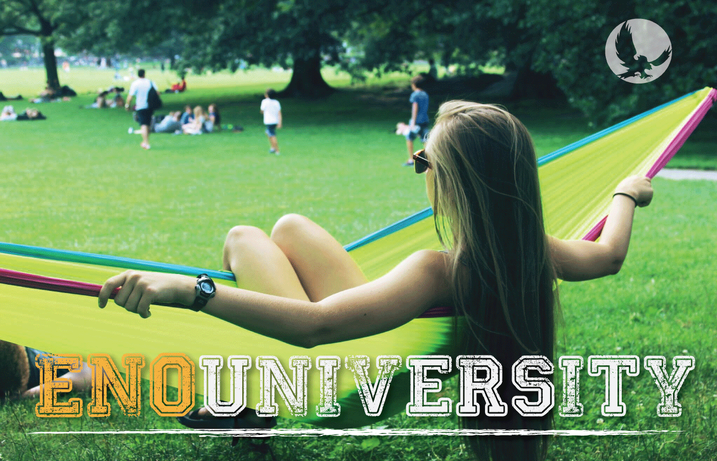 girl hanging in a hammock on a university quad