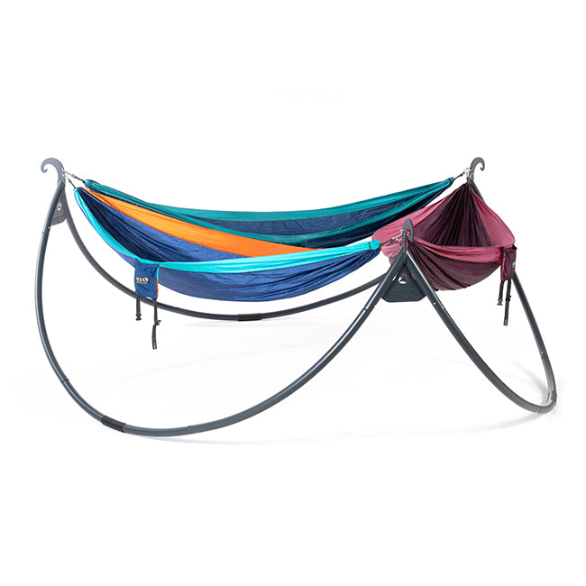 Studio image of ENO ENOpod Hammock Stand on white background with three hammocks hung.