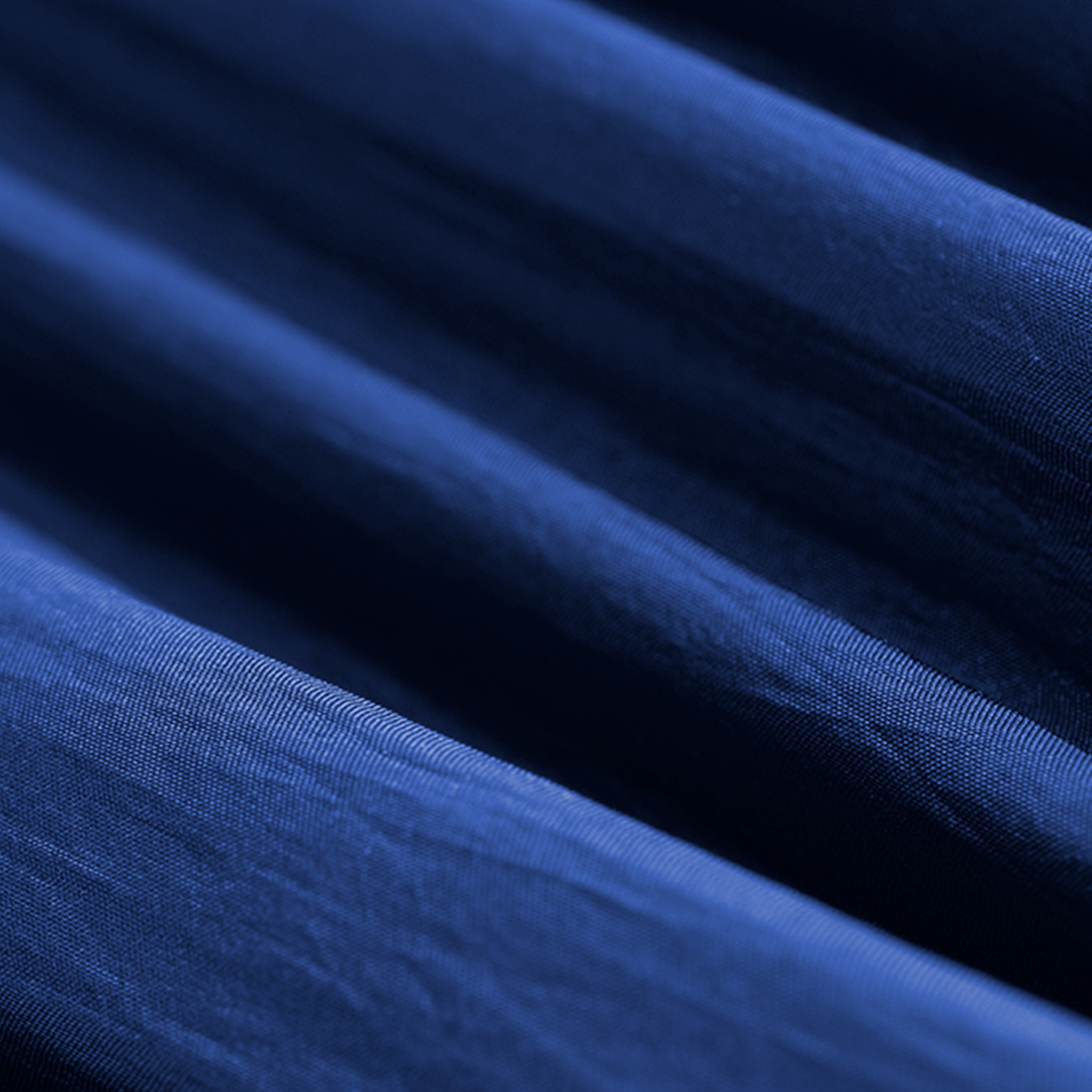 A detail photo of blue hammock nylon fabric. 