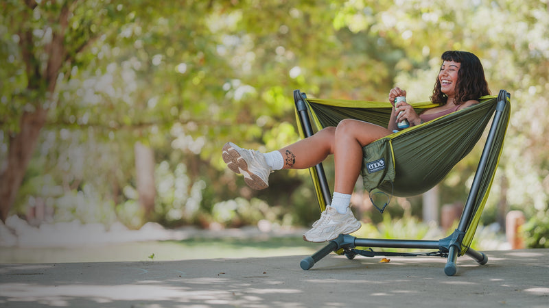 Looping animation of the ENO Parklite Hammock Chair Stand in Charcoal, Agave, and Sky colorways.