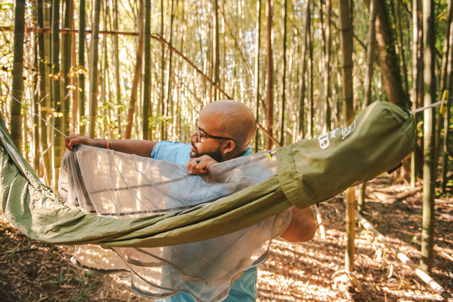 Person Setting up ENO JungleNest™ Hammock