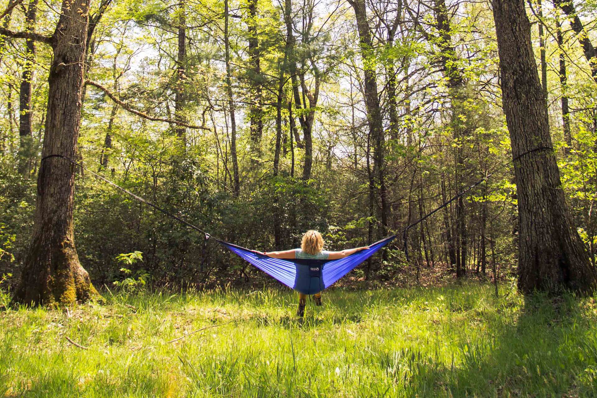 Eagles Nest Outfitters, Inc. Hammock Straps, ENO Atlas™ XL Hammock Straps holding up a woman in an ENO hammock